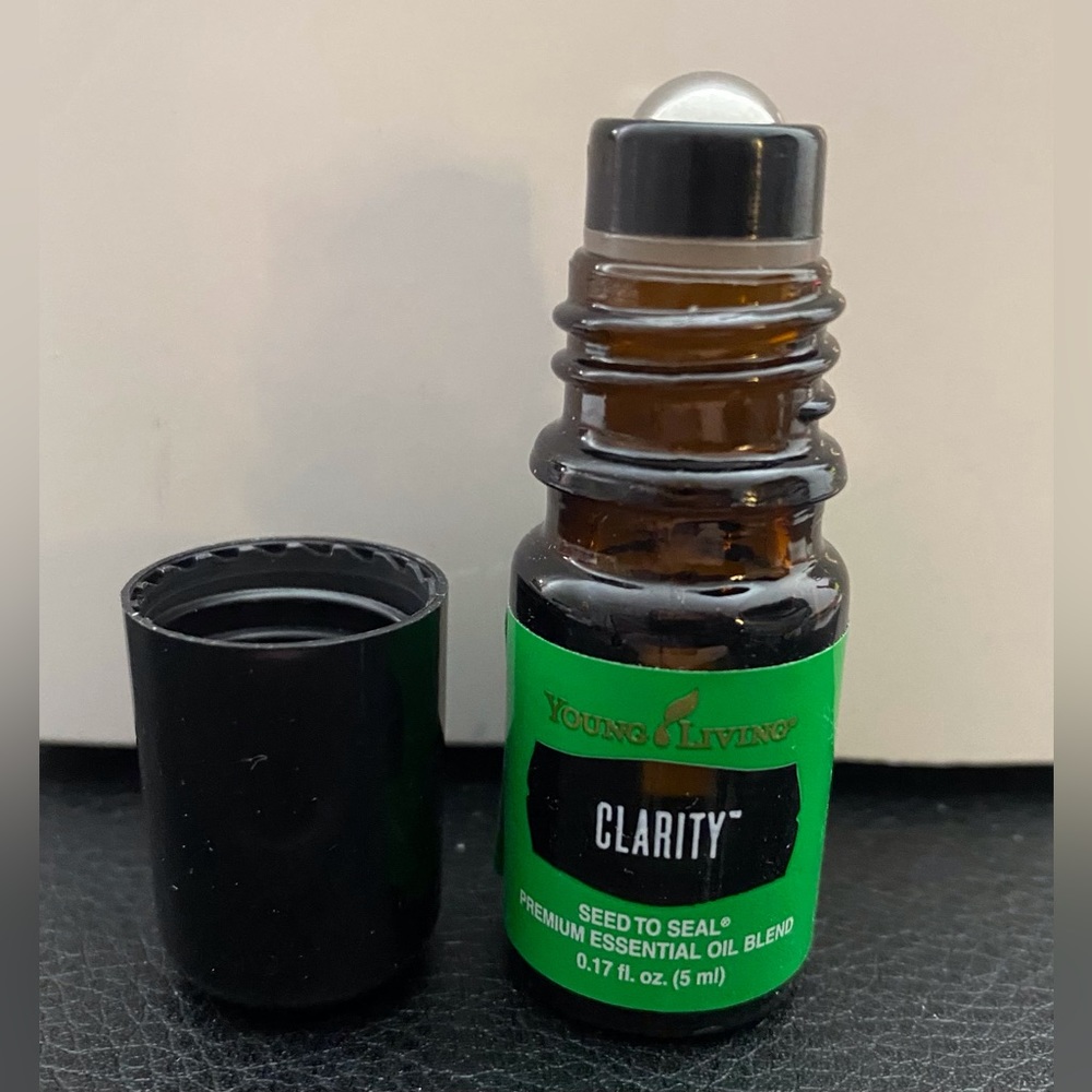 New, unused Clarity Essential Oil Blend with roller top 5ml